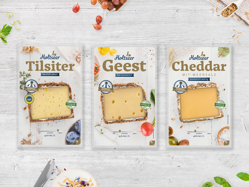 Käseverpackungen der Holtseer Landkäserei: Tilsiter, Geest und Cheddar